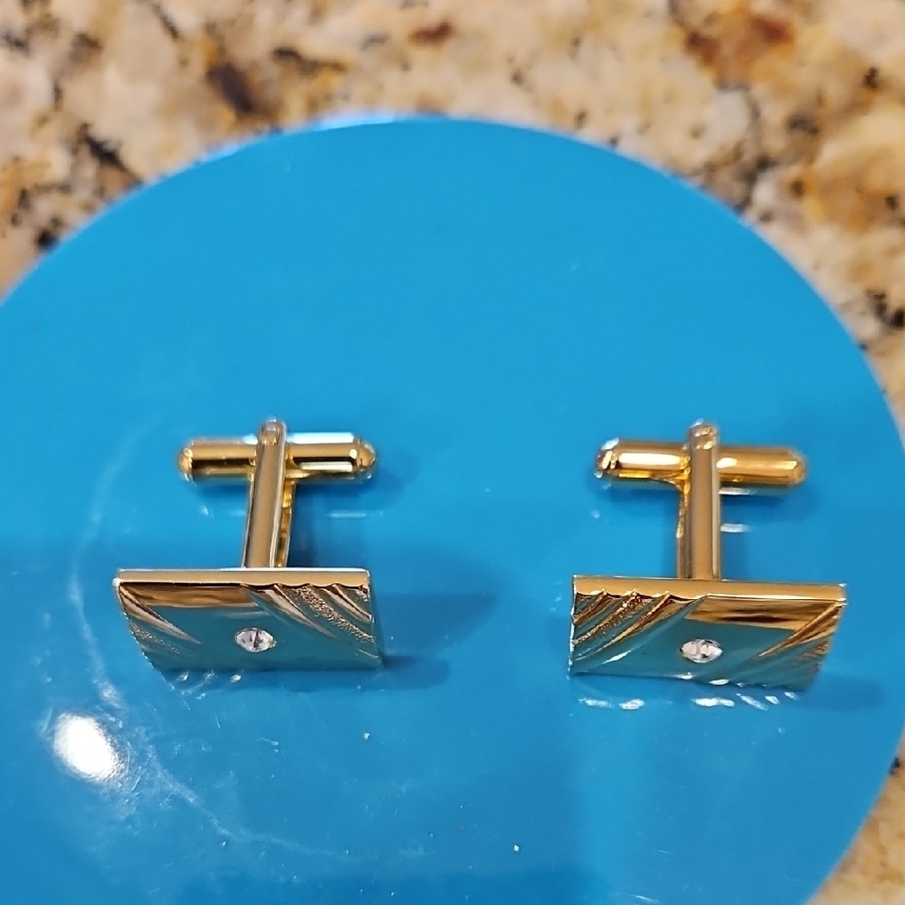 Elegant Gold Cufflinks with Diamond Accent
